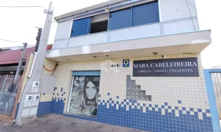 Sobrado com Loja comercial e residencia com 3 dormitorios nos fundos na Av. A j renner.