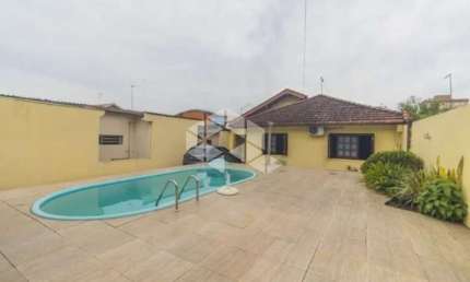 Casa térrea, com 3 Quartos, sendo 1 suíte, com piscina, Bairro Scharlau, São Leopoldo/RS