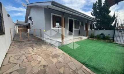 Casa 2 dormitórios, vaga para 3 carros, área privativa 110m² São José/Canoas