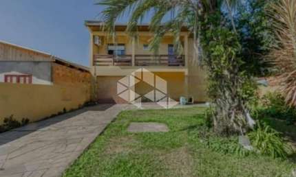 Casa com 3 quartos sendo uma suite na Harmonia em Canoas