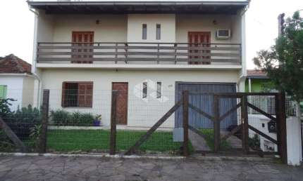Casa com 4 quartos à venda na Rua Corrêa de Mello, 600, Sarandi, Porto Alegre