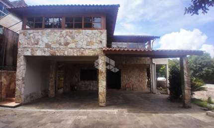 Casa/sobrado à venda, 510m², 5 dormitórios sendo 3 suítes, 5 vagas, bairro Vila Nova, Porto Alegre/RS