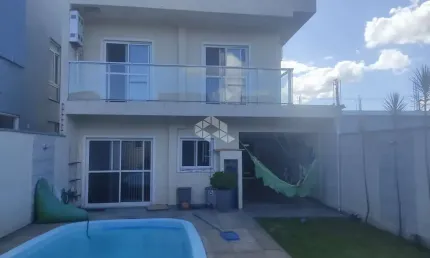 Casa/sobrado à venda, com piscina, lareira, 2 vagas cobertas, 3 quartos em Eldorado do Sul/RS