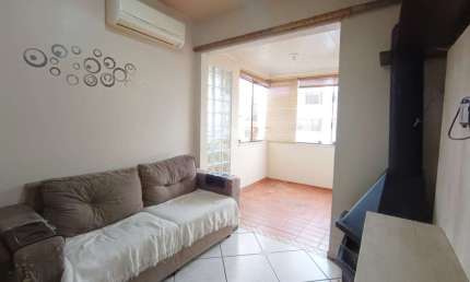 APARTAMENTO DE 1 DORMITORIO COM SACADA, CHURRASQUEIRA E VAGA