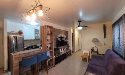 Apartamento de 3 dormitórios(1suíte), 2 banheiros, sacada, pátio privativo, 1 vaga de garagem.