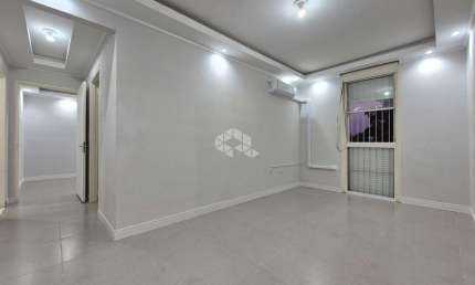 Apartamento de 2 dormitórios e 1 vaga de garagem, no bairro Humaitá, em Porto Alegre.