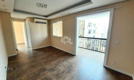 Apartamento de 2 dormitórios, sacada integrada e churrasqueira no bairro Humaitá, Porto Alegre