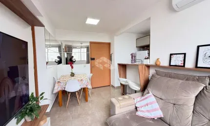 Apartamento de 2 dormitórios e 1 vaga de garagem, no bairro Humaitá, em Porto Alegre.