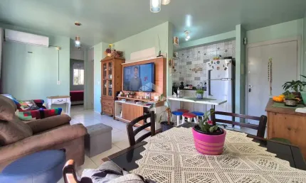 Apartamento de 2 dormitórios e 1 vaga de garagem, no bairro Humaitá, em Porto Alegre.