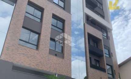 APARTAMENTO 2 DORMITÓRIOS SENDO 1 SUÍTE NO BAIRRO CARVOEIRA