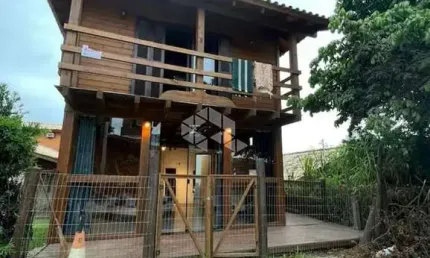 TERRENO COM SOBRADO E DOIS CHALES NA PRAIA DO ROSA - IMBITUBA/SC