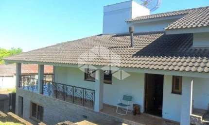 Casa com 3 dormitórios sendo 1 suíte no bairro Floresta em Estância Velha