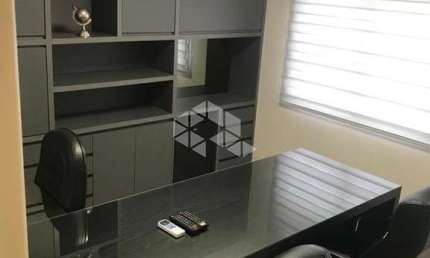 Compre: Sala comercial, no Centro de Novo Hamburgo, já Locada. Ótimo INVESTIMENTO.