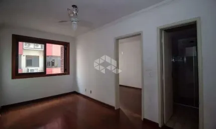 Apartamento com 01 quarto , ampla sala, banheiro e com vaga de garagem.