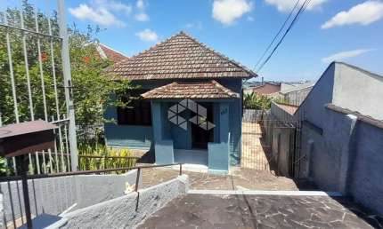 Casa com 3 quartos à venda na Rua Santiago Dantas, 183, Cascata, Porto Alegre