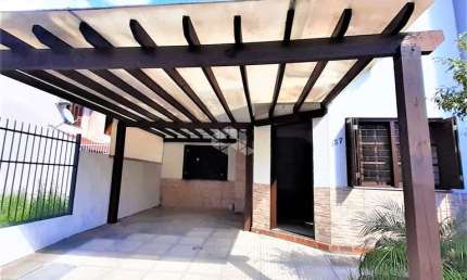 CASA ESTILO SOBRADO COM 4 DORMITÓRIOS SENDO 2 SUÍTES