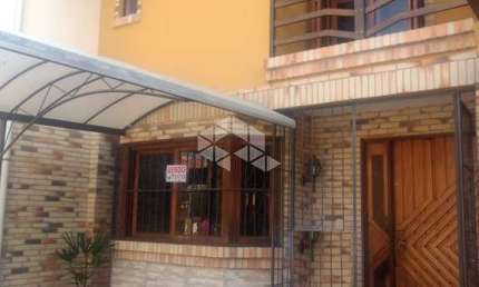 Casa em condomínio fechado com 3 quartos à venda na Avenida Edgar Pires de Castro, 1286, Hípica, Porto Alegre