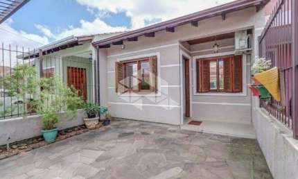 CASA 77M² - 2 DORMITÓRIOS, 1 VAGA NO BAIRRO ABERTA DOS MORROS