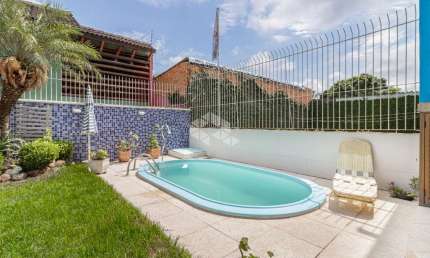 Casa 3 dormitórios com piscina  no bairro  Ipanema, Porto Alegre
