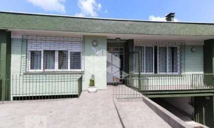 Casa com 5 quartos à venda na Rua Campos Elíseos, 291, Glória, Porto Alegre