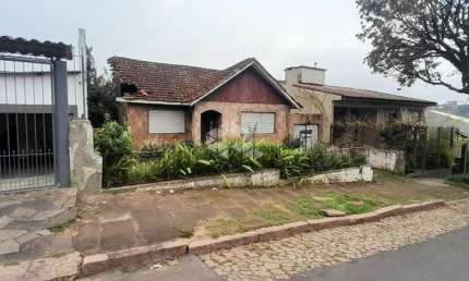 Casa com 3 quartos à venda na Rua Doutor Ney Cabral, 363, Nonoai, Porto Alegre