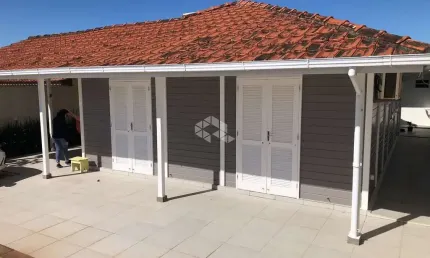 Casa à venda  com 3 dormitórios e piscina na Praia do Sonho - Palhoça / SC.