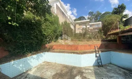 Sobrado à venda no Tucuruvi - 5 quartos (3 suítes), piscina, salão de festas e 7 vagas em 1.056m² de terreno