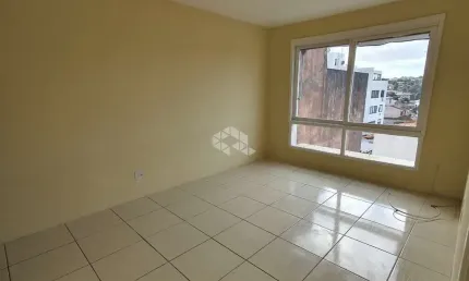 Apartamento de dois quarto,  com garagem no  bairro glória.