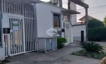 Apartamento térreo com 02 dormitórios e box à venda no bairro parque santa fé
