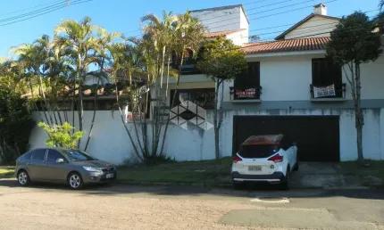 Casa com 4 quartos à venda na Rua Doutor Guilherme Schultz Filho, 130, Jardim Isabel, Porto Alegre