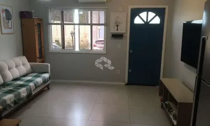 CASA EM CONDOMÍNIO 2 QUARTOS E 1 VAGA DE GARAGEM NO BAIRRO CAVALHADA
