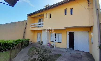 Casa em condomínio fechado com 4 quartos à venda na Rua Carlos Ferreira, 130, Teresópolis, Porto Alegre