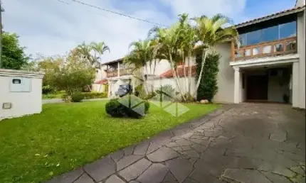 Casa em condomínio fechado com 3 quartos à venda na Avenida Eduardo Prado, 2050, Cavalhada, Porto Alegre