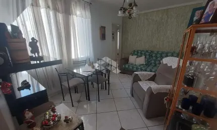 APARTAMENTO DE DOIS DORMITÓRIOS COM DEPENDÊNCIA NA CIDADE BAIXA