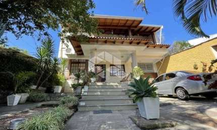 Casa com 3 quartos à venda na Rua Irmão Inocêncio Luís, 601, Jardim Itu Sabará, Porto Alegre