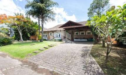 Casa em condomínio fechado com 3 quartos à venda na Avenida Juca Batista, 8000, Belém Novo, Porto Alegre