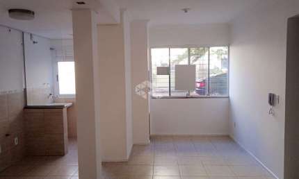Apartamento com 2 dormitórios e box escriturado no Guarujá