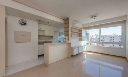 Apartamento de 65m2 de 2 dormitórios, uma suite com 2 banheiro e 1 vaga e semi-mobiliado