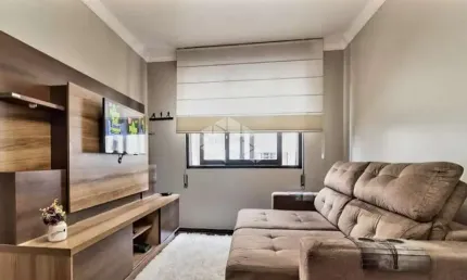 Crédito Real vende Apartamento de 1 Dormitório com 1 vaga de garagem escriturada.