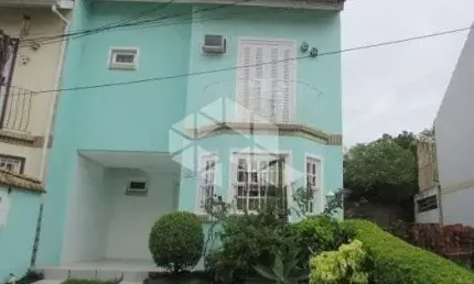 Casa em condomínio fechado com 3 quartos à venda na Rua Osório Mendes Ouriques, 332, Guarujá, Porto Alegre