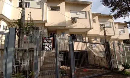 Casa 3 dormitórios, sendo 1 suíte,,living,cozinha,área de serviço,4 banheiros,pátio fechado,garagem 2 carros