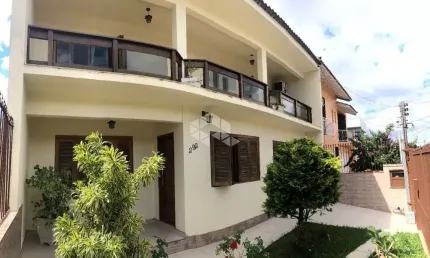 Casa com 3 quartos à venda na Avenida Edu Las Casas, 292, Parque Santa Fé, Porto Alegre