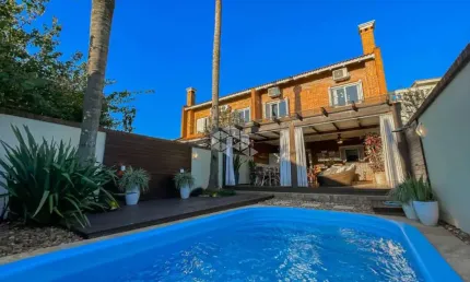 Casa de 3 suítes e 4 vagas de garagem bairro chácara das pedras