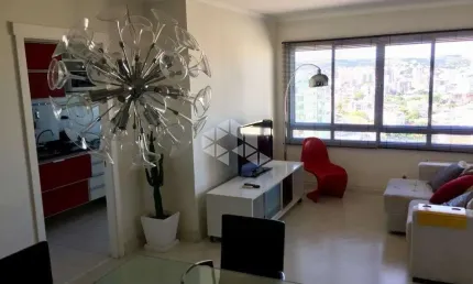 apartamento semimobiliado em andar alto no Rio Branco em Porto Alegre