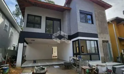 CASA A VENDA NO RESERVA DA ALDEIA - GRAVATAÍ  ÚNICA CASA NOVA A VENDA NO CONDOMÍNIO