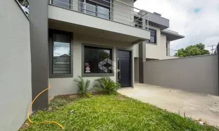 Casa 3 dormitórios, suíte, Varanda, piso porcelanato, vaga coberta, churrasqueira, bairro Pátria Nova em Novo Hamburgo