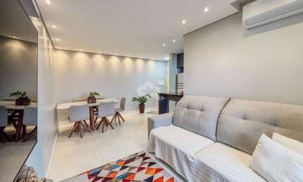 Apartamento 2 dormitórios, churrasqueira, varanda, vista panorâmica, piso porcelanato, 75m², 1 vaga, Bairro Vila Nova em Novo Hamburgo.