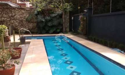 Casa em condomínio fechado com 3 quartos à venda na Avenida Edgar Pires de Castro, 540, Hípica, Porto Alegre