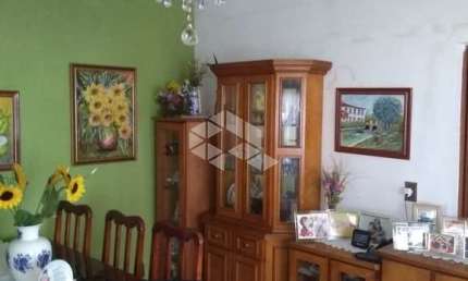 Casa com 3 quartos à venda na Rua Olinda, 338, São Geraldo, Porto Alegre