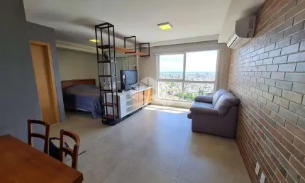 Studio de 45m2, living, cozinha com churrasqueira, banheiro social, mobiliado